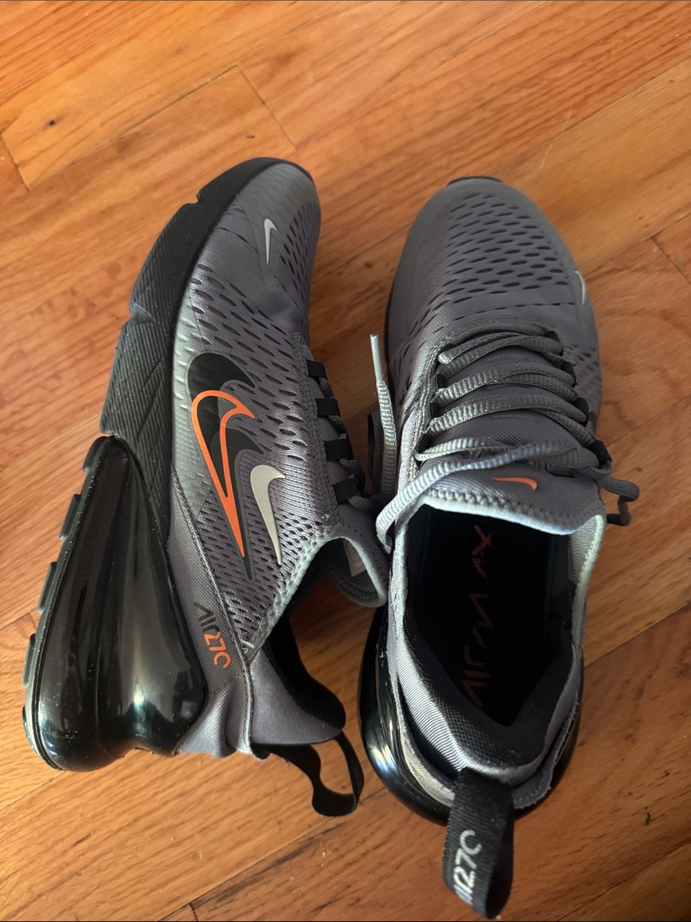 Nike Men’s Grey Sneakers with Orange Swoosh Accents